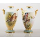 Pair of Aynsley china urn-shaped vases, one painted with 'The Linnet', by T.G.
