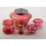 Cranberry glass dimple moulded jug, 16cm and a collection of cranberry glassware.