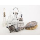 Silver and plated items, a silver-plated six bottle cruet, glass perfume bottle with silver collar,