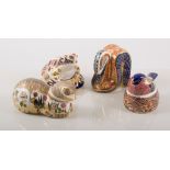 Five Royal Crown Derby paperweights, including Cottage Garden Cat, some with silver buttons,