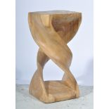 Abstract carved hardwood sculptured stand, 59cm.