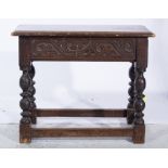 Carved oak stool, with turned supports, joined by stretchers,