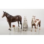 Beswick figures, Welsh horse, 16cm; and a Pinto horse, 17cm; Beswick dog Terrier,