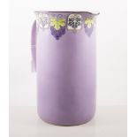 Edwardian wash basin and jug, by Crownford ware, vine design on lilac ground.