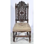 Continental carved oak hall chair, with tapestry upholstered seat.