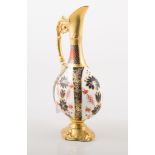 Royal Crown Derby, Imari pattern ewer, pattern no.1128, 26cm; and a similar urn-shaped vase, (2).