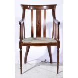 Edwardian inlaid mahogany elbow chair.