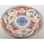 Four Eastern pottery chargers,