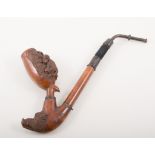 Carved briarwood pipe, carved with wild boar and hunting scene, 26cm.