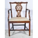 George III mahogany elbow chair, carved cresting, pierced and carved vase shaped slat,