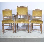 Set of eight French limed walnut dining chairs.