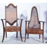 Two elbow chairs, cane backed.