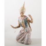 Lladro figure of a Thai dancer, damaged.