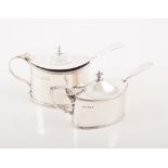 Two silver oval drum mustards with spoons,
