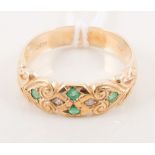 An emerald and diamond dress ring,