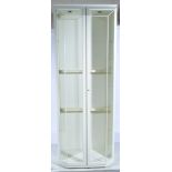 A modern display cabinet, cream laminated finish W80cm x D55cm x H220cm.