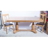 A modern light oak dining suite, comprising extending dining table, rectangular top,