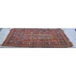 Hamadam rug, five rows of three tiles, floral border, 176cm x 100cm, repaired; and another rug,