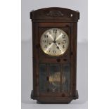 Oak wall clock, silvered dial, movement by Gustav Becker, 66cm.