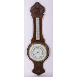 Victorian walnut banjo barometer, scrolled frame with some mother of pearl inlays, silver dial,