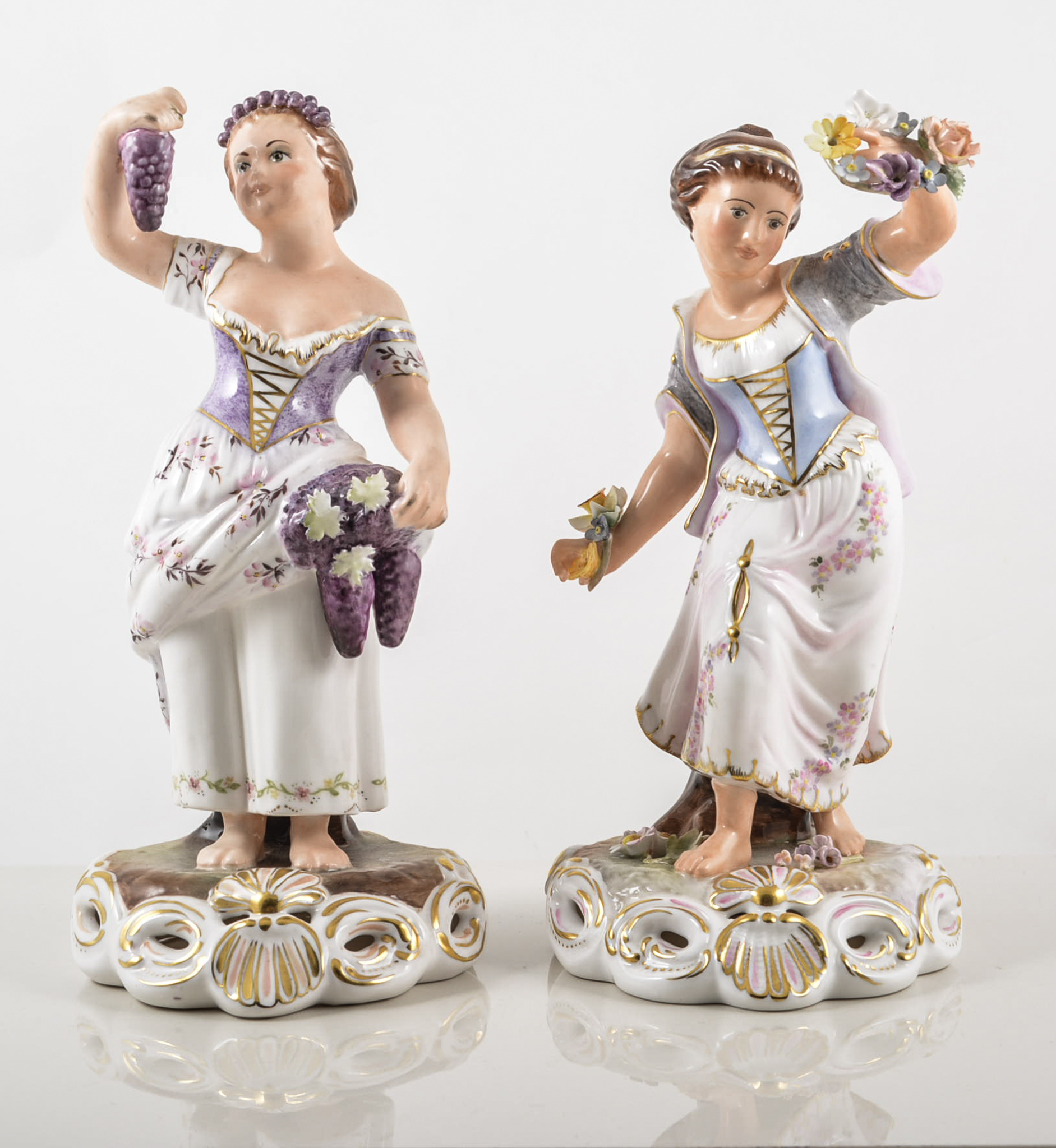 Pair of Royal Crown Derby figures, "Autumn" by J. Morrison, 'Spring" by S Whitbread, height 22.