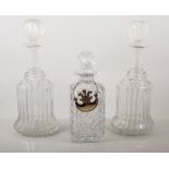 Lead crystal spirit decanter, with a silver label,