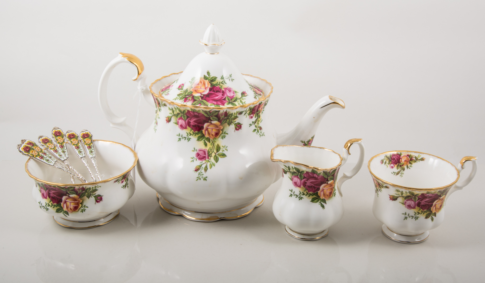 Royal Albert, 'Old Country Roses', a 6-place tea service, including teapot, cups/ saucers,