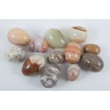 Collection of stone eggs, quantity in box.