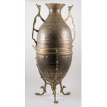 Persian brass and white metal floor vase, twin handles, tripod stand, height 76cm.