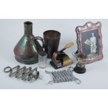 Silver cigarette case, silver mounted glass bottle, assorted plated items, an ebonise ddesk stand,