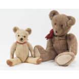 Two vintage teddybears, one plush with jointed limbs and growler, the other larger,