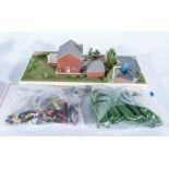 Scale architects model house on base, 1:75 scale, with a selection of model spares, trees, vehicles,