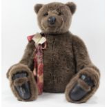 Large plush bear by Gund, "Hugh Mungus" limited edition signed on the base of the foot, with tags.