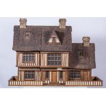 Robert Stubbs Dolls House, 'The Beam House', designed as a thatched villa, base 137cm x 58cm,