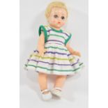 Madam Alexander doll, made in USA, 1950s with short blonde hair, sleepy eyes,