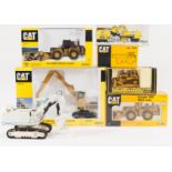 Diecast construction vehicle models, to include Hydraulikbagger Cat 245,