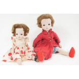 Two American "Binnie Walker" hard plastic dolls, one in original branded outfits, (2).