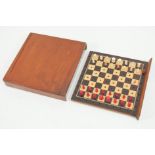 Travelling chess set by Croisdale, Leeds c1880, in wooden sliding case, ivory carved pieces,