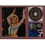 Madonna signed photo, framed with "Music" album CD and cover, with certificate, 39cm by 29cm.