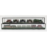 Two model train locomotives, both in glass presentation cases, 70.