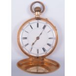 A yellow metal full hunter pocket watch white enamel dial with Roman numeral chapter ring and outer