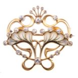 A diamond and enamel brooch in the Art Nouveau style,