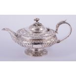 A George IV silver teapot, by William Hewitt, London 1825, of compressed circular and pedestal form,