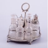 A George III oval silver cruet frame, makers marks rubbed, London probably 1809,