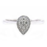 A pear shaped diamond cluster ring,