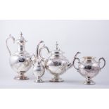 A Victorian silver four-piece teaset, by Henry Wilkinson, London 1877, each piece of vase shape,