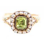 A peridot and pearl ring and similar brooch,