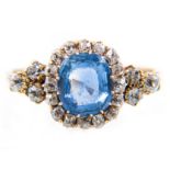 A sapphire and diamond rectangular cluster ring, one rectangular cushion shaped sapphire 9mm x 8.