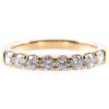 A diamond half eternity ring, eight brilliant cut diamonds claw set in an all yellow metal mount,