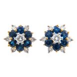 A pair of sapphire and diamond circular cluster earrings,